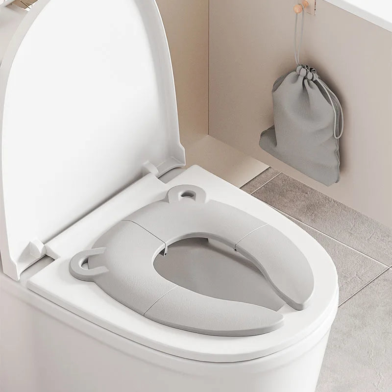 Assento Sanitário Infantil Dobrável para Viagem – Troninho Portátil de Treinamento com Almofada Confortável e Design Ergonômico