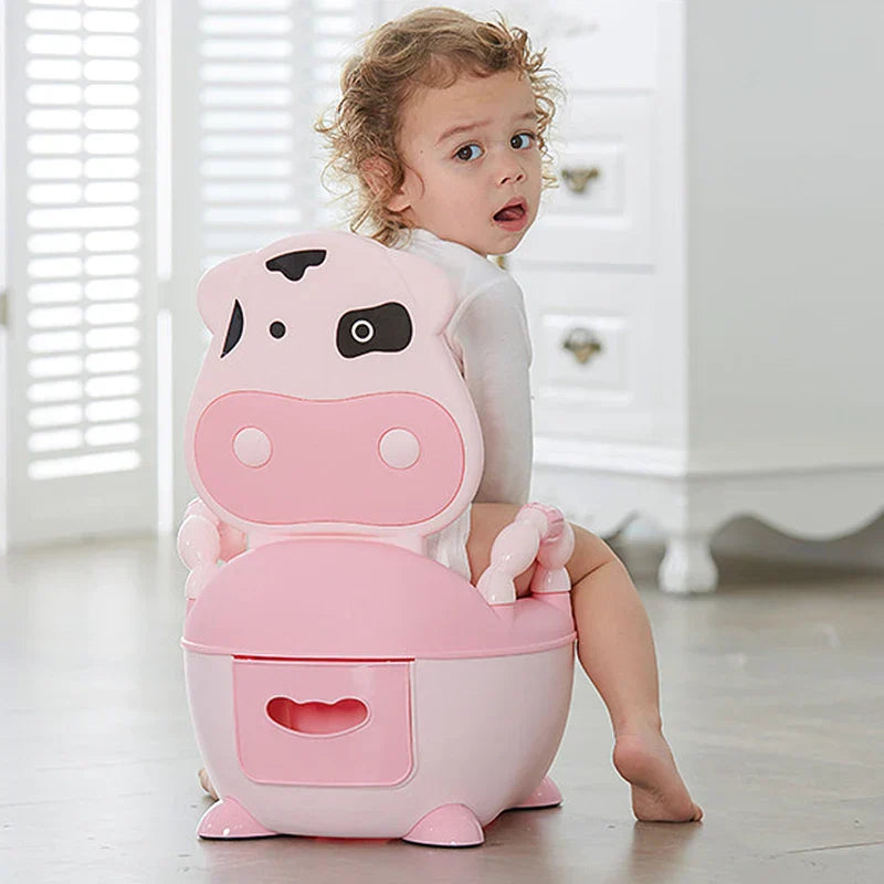 Troninho Infantil Portátil com Tampa – Assento Sanitário de Treinamento com Design Cartoon de Vaquinha